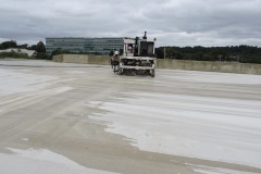 September 2024 - Cutting grooves in the new Rockhill Drive bridge to improve drainage